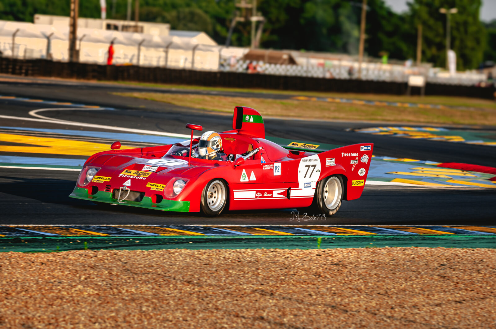 Alfa Romeo 33 TT12 rossa numero 77 Merzario Andretti in azione a Le Mans